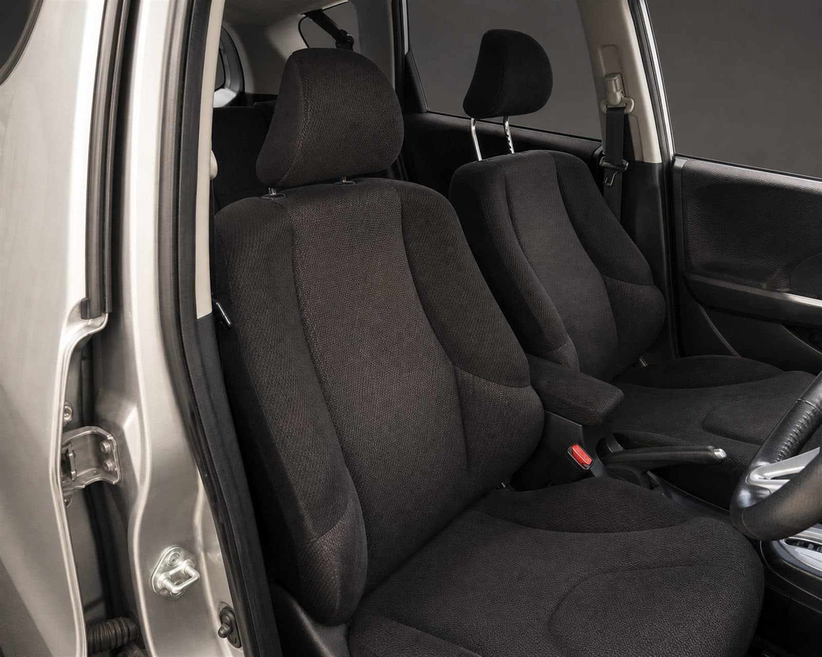 Front fabric seats inside the 2012 Honda Fit