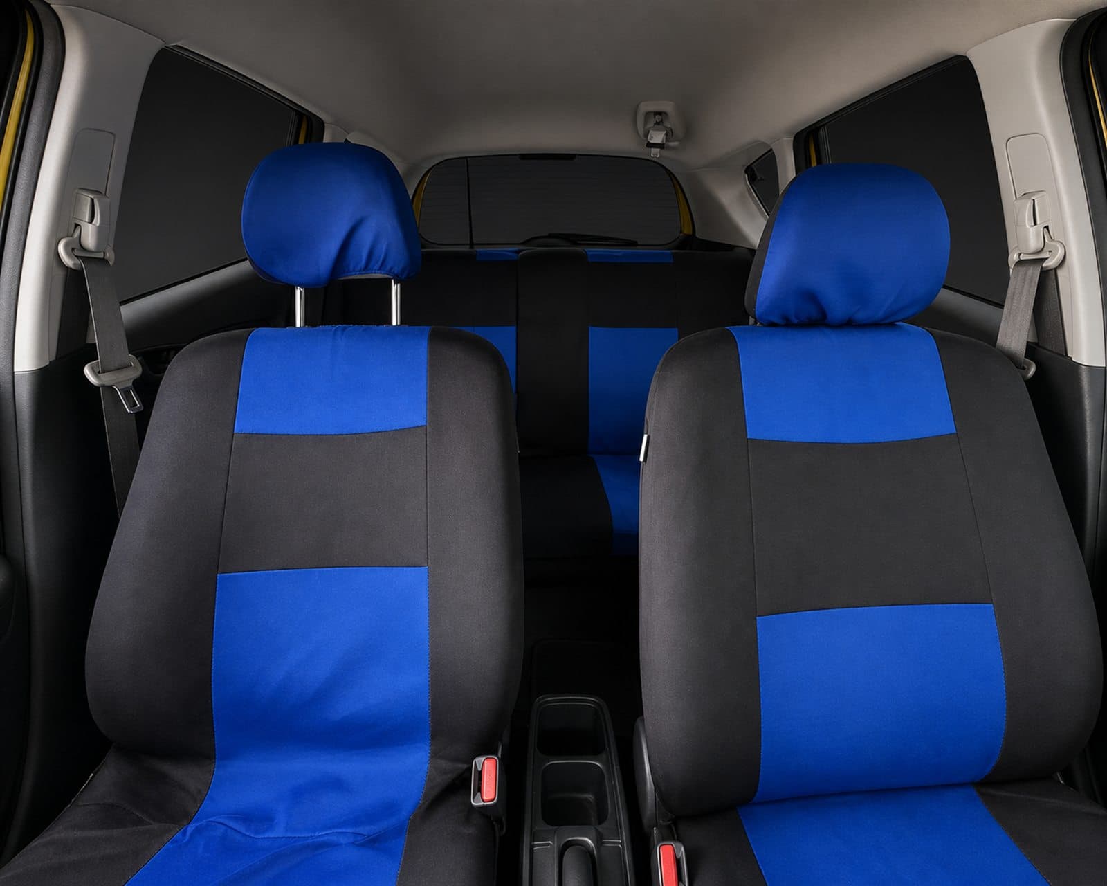 Blue-and-black covered seats inside the Honda Fit