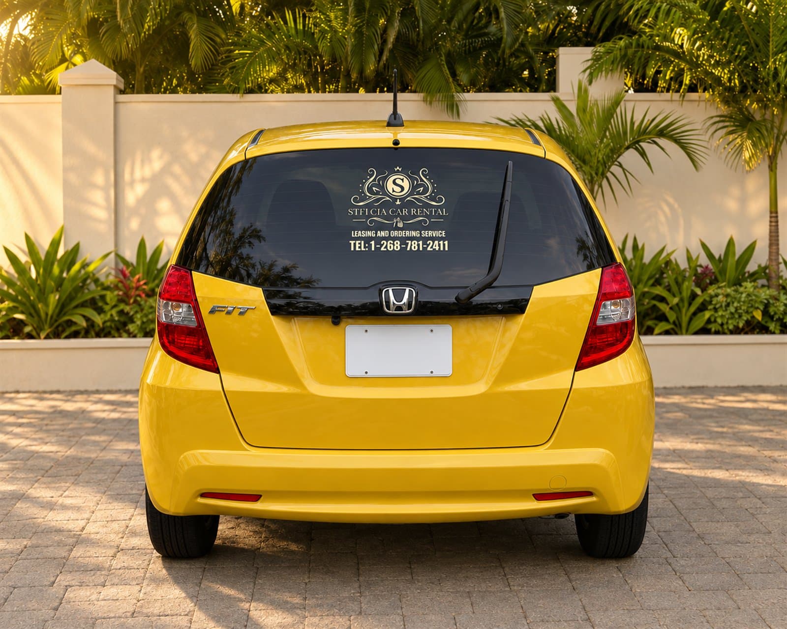 Rear view of the yellow Honda Fit