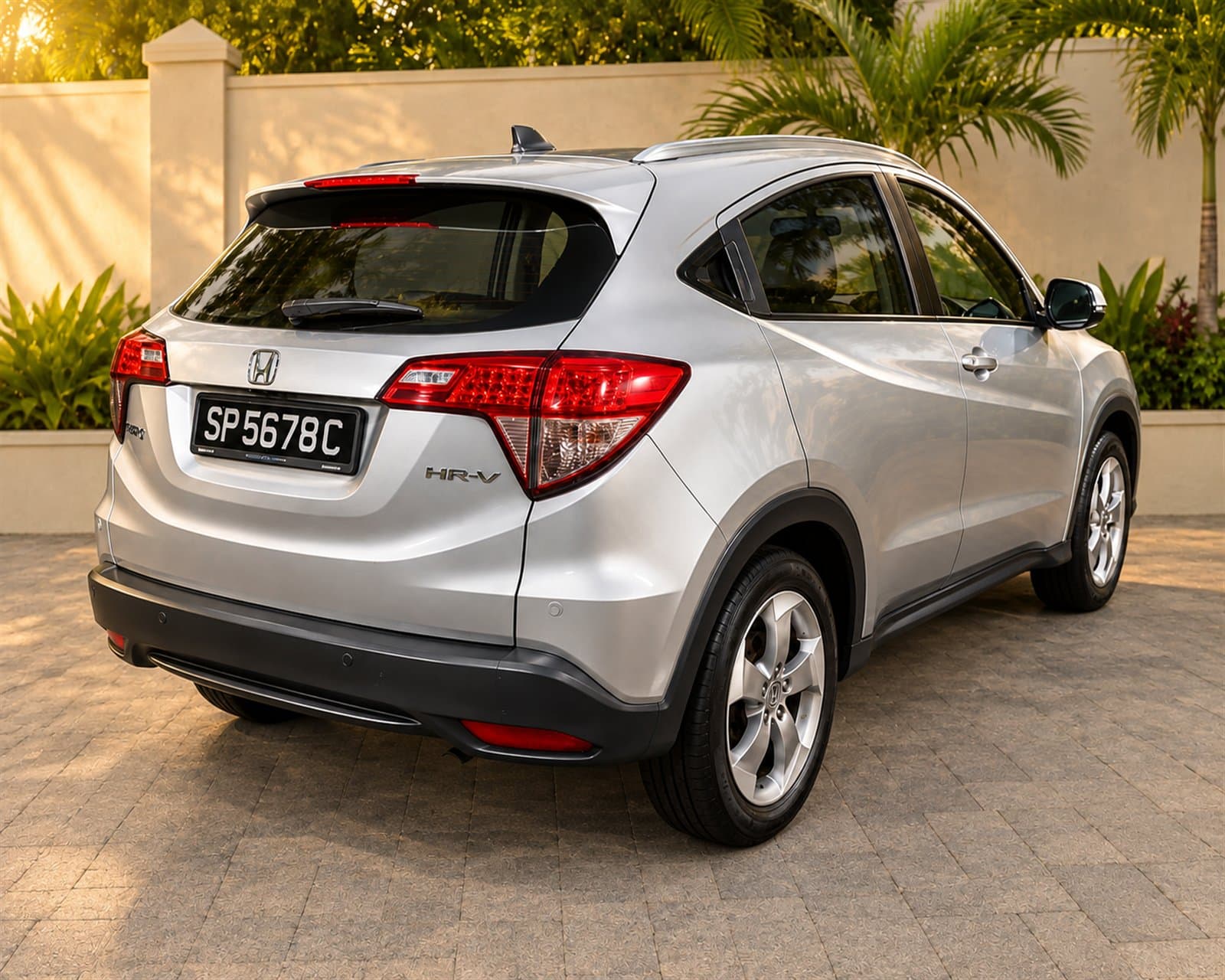 Rear three-quarter view of the silver Honda HR-V