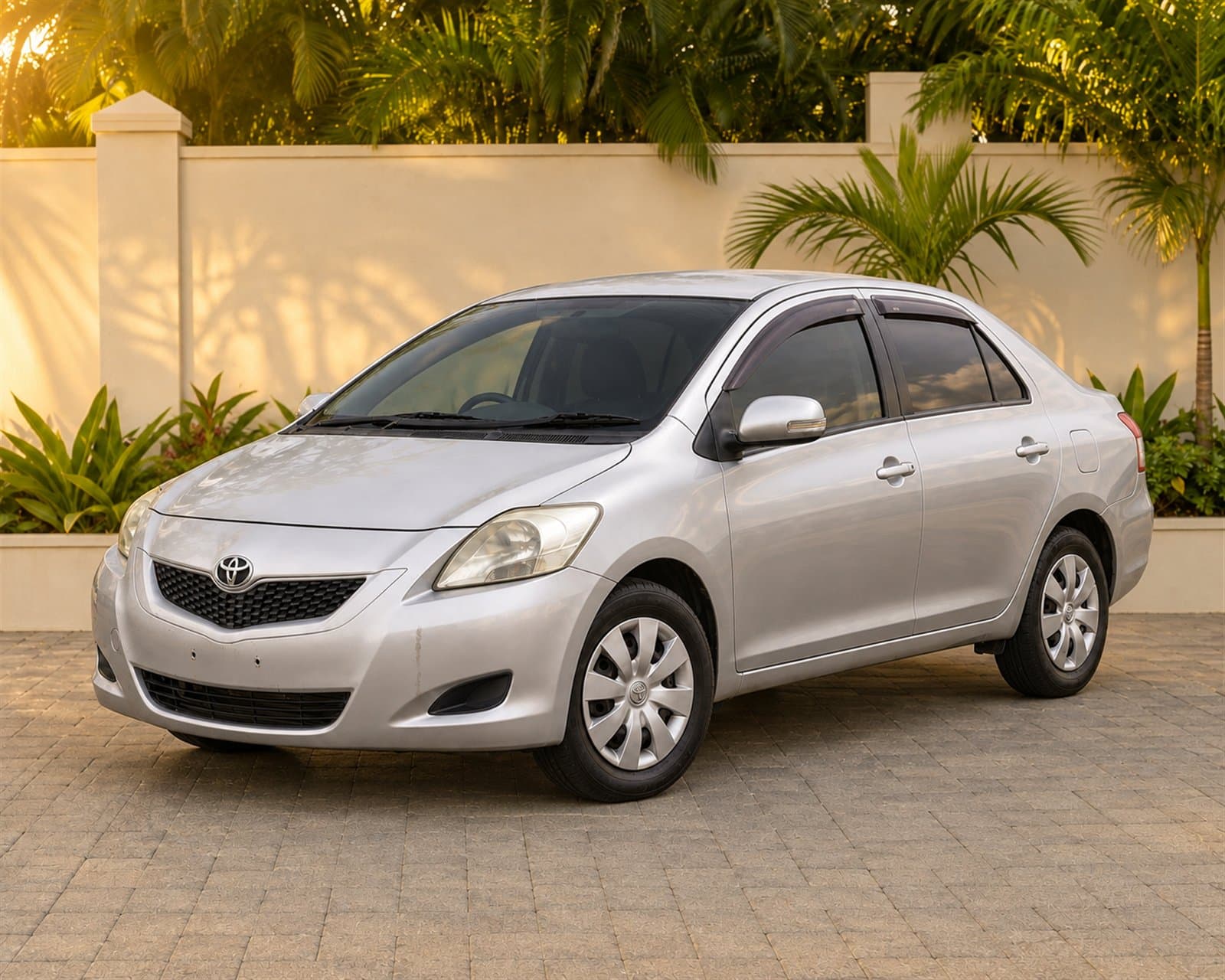Side three-quarter view of the silver Toyota Belta