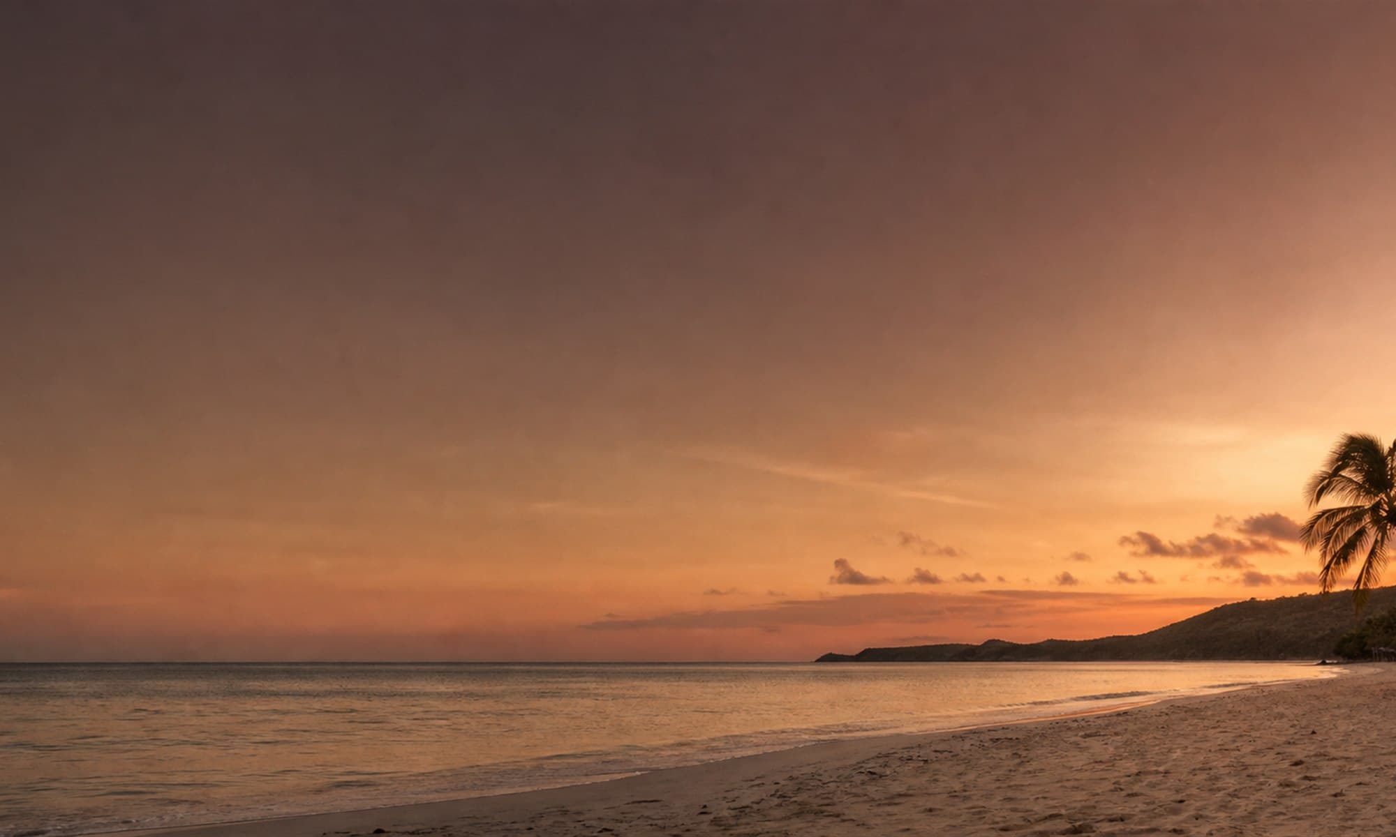 Sunset over an Antiguan beach
